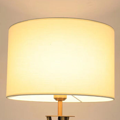 Nordic-style tripod floor lamp in iron and wood – Light-coloured cylindrical lampshade